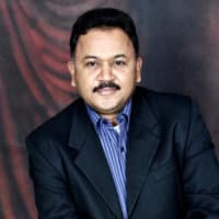 Captain K. Srinivas (MCR, MRICS)